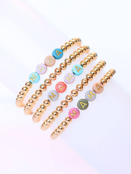 Gold Beaded Stretch Bracelet – Multi‑Color Letter Beads